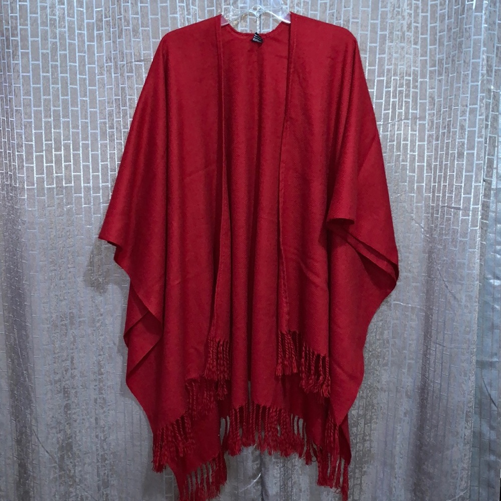 Red cape with fringe